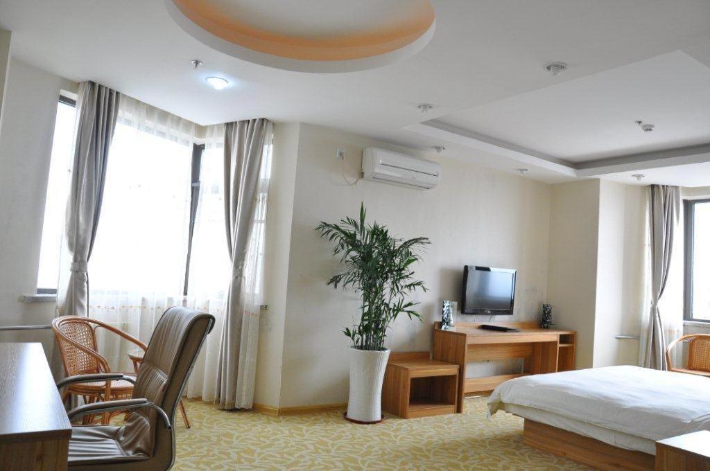 Super 8 Hotel Qingdao Railway Station Gui Zhou Road Rom bilde